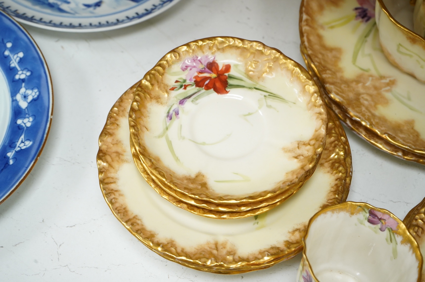 A ‘Nautilus’ porcelain floral and gilt decorated tea service, sandwich plates 23cm diameter.